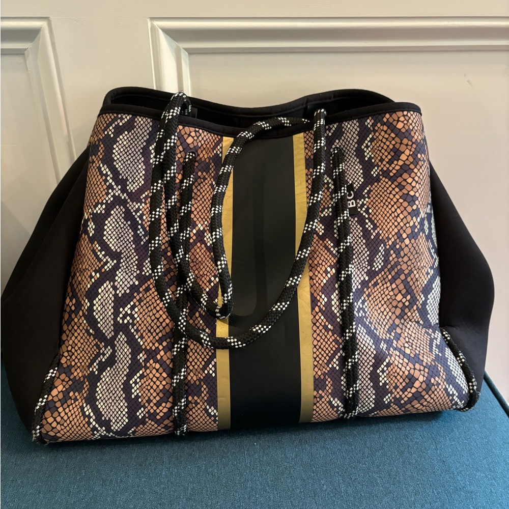 Excellent condition neoprene handbag with clutch/wallet.